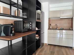 Appartements Agreable F2 refait a neuf, place de parking privee et climatisation : photos des chambres