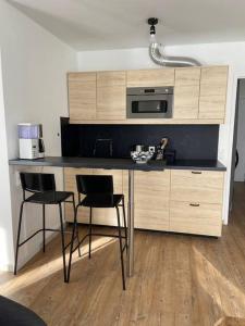 Appartements LE COCON - Homee : photos des chambres