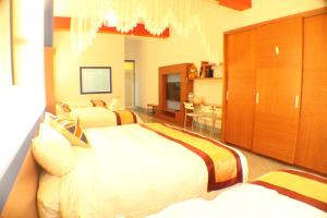 Suite Gia Đình Deluxe (Deluxe Family Suite)