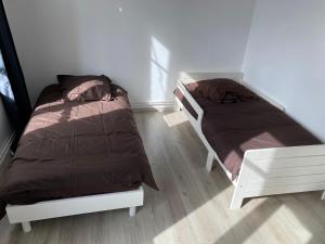 Appartements Joli appartement avec parking gratuit sur place : photos des chambres