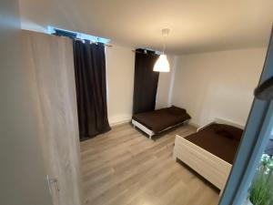 Appartements Joli appartement avec parking gratuit sur place : photos des chambres