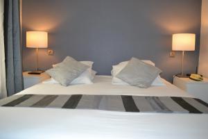 Hotels Saint Ferreol : photos des chambres