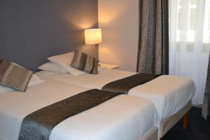 Hotels Saint Ferreol : photos des chambres