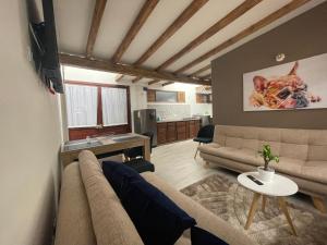 Apartamentos y Habitación PUERTA DE LA VILLA