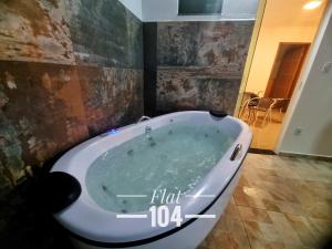 TH Flats com Banheira de Hidromassagem