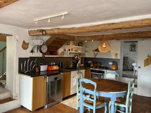 Maisons d'hotes Appartement avec terrasse dans un domaine agricole : photos des chambres