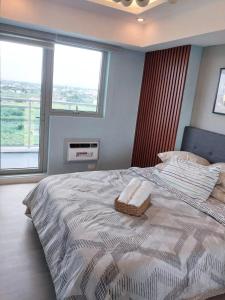 1BEDROOM Unit at Azure north With Netflix up to 6PAX