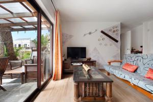 Tropical piso Ana con palmera