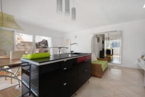 Piso Loft tropical Doa