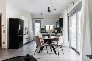 Teal Faliro House by UPSTREET