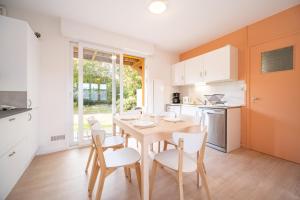 Appartements Jardin acces plage prive - Petit-Fort-Philippe : photos des chambres