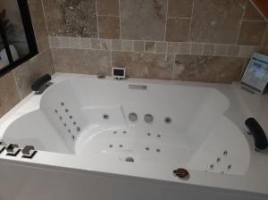 Appartements Appartement chaleureux avec Jacuzzi : photos des chambres