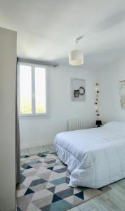 Appartements Appartement de l'Hippodrome avec deux chambres : photos des chambres