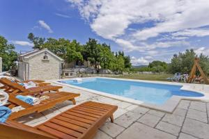 Maslina in Popovići (Haus für 5-7 Personen)