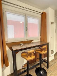 Appartements STUDIO HYPER CENTRE SAFARI TOUT EQUIPE WIFI NETFLIX 2PERS : photos des chambres