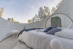 Tentes de luxe O Clair de Bulles Celeste : photos des chambres