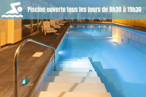 Appartements Le Fitness & Business Studio - Airbus -Piscine Spa : photos des chambres