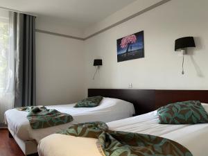 Hotels L'EMBLEME - BOUTIQUE HOTEL : photos des chambres