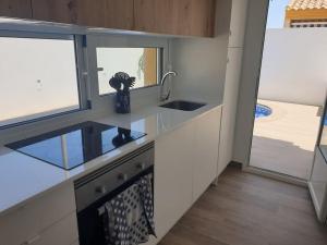 Dúplex mediterráneo con piscina y cenador