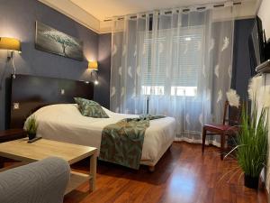 Hotels L'EMBLEME - BOUTIQUE HOTEL : photos des chambres