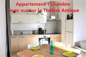 Appartements Holiday in Arles -Appartement du Theatre Antique : photos des chambres