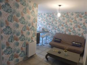 Appartements Au Champ Fleuri : photos des chambres
