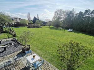 Volledig gerenoveerde luxe gastsuite met ontbijt