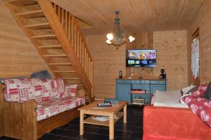 Chalets la cache des relles : photos des chambres