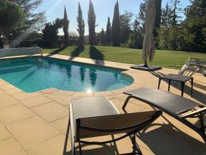 Appartements Amity. Exclusive poolside garden apartment : photos des chambres