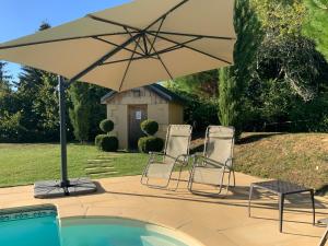 Appartements Amity. Exclusive poolside garden apartment : Appartement 1 Chambre