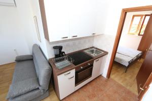 Apartment in Stara Novalja with sea view, balcony, air conditioning, WiFi (4897-2)