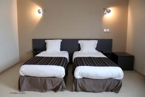 Hotels Fasthotel Le Rale Des Genets : photos des chambres