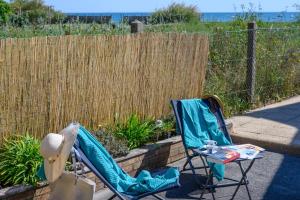 Maisons de vacances Fleur de Sable et Les Pieds Dans L'Eau - Maisons au bord de l'eau : photos des chambres