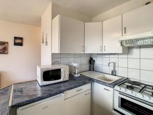 Appartement lumineux 35m², 5 pers, balcon sud, proche pistes, parking, wifi - FR-1-417-54