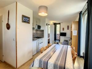 Appartement lumineux 2 étoiles, 32m², animaux admis, 6 pers., parking, ski-inski-out - FR-1-417-123