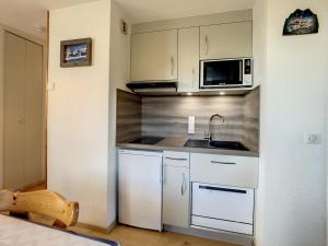 Appartements Appartement lumineux 2 pieces avec balcons et animaux admis a La Toussuire - FR-1-417-123 : photos des chambres