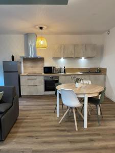 Appartements L’Oradou - Neuf - Tout equipe - Parking - Wifi : photos des chambres