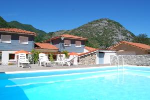 Maisons d'hotes Les Terrasses De Castelmerle : photos des chambres