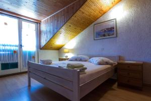 Apartments with parking space Barbat, Rab - 20080