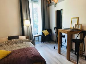 Appartements Charmant studio proche du centre et des thermes : photos des chambres