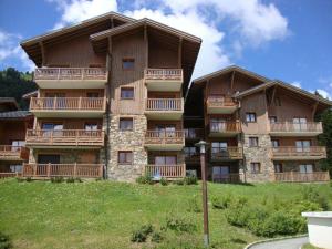 Maisons de vacances Appartement Duplex 4P avec Piscine Interieure, 8 Pers, Balcons, Parking - Villard-sur-Doron - FR-1-594-183 : photos des chambres