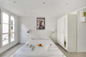 Appartements CMG - Cosy studio Le Marais : photos des chambres