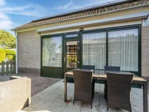 Inviting holiday home in Baarland with terrace - Driewegen