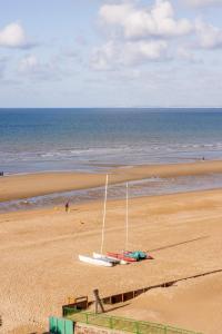 Appartements Havre de paix a deux pas de la plage - Arrivee autonome, Parking prive et gratuit : photos des chambres