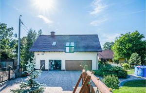 Nice Home In Ploskinia With Sauna Wifi And Outdoor Swimming Pool