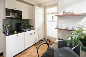 J Huus 4 I 99m I Strand I Kurplatz I EG I Terrasse I Ruhig I King I FB Heizung I Privateingang I Huus Design