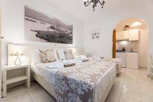 Quadruple Room room in Panos Luxury Studios