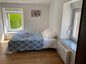 Appartements Gite du cerisier : photos des chambres