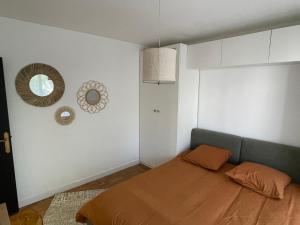 Appartements Appartement calme, climatisation, parking : photos des chambres