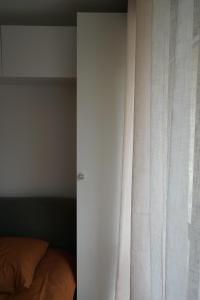 Appartements Appartement calme, climatisation, parking : photos des chambres